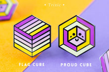 Load image into Gallery viewer, Trixic pride flag Proud Cube 1.25-inch hard enamel pin Edition 1 with rubber clutch backing, lifestyle styling shot
